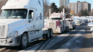 Clip thumbnail: The convoy stretches along the Sir John A